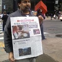 ARUN GUPTA, OCCUPIED WALL STREET JOURNAL